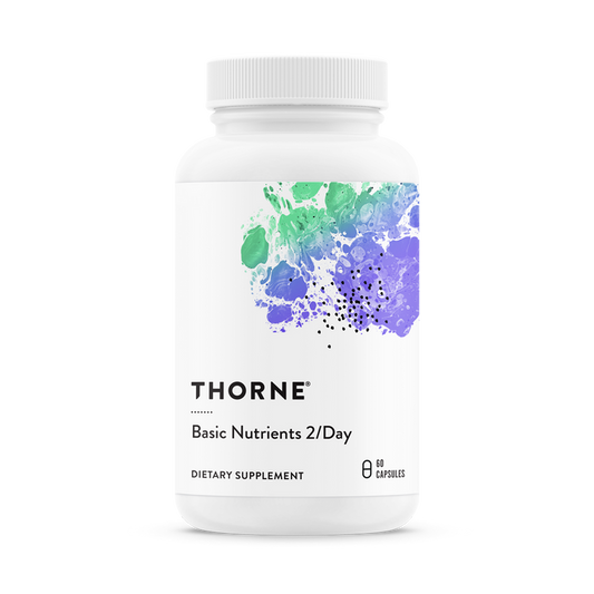 A white bottle of Thornes Basic Nutrients 2/Day daily multi, offering comprehensive nutritional support with 60 capsules, features a label with abstract splashes of green, blue, and purple paint.