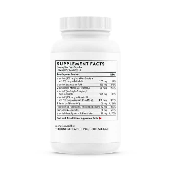 The white bottle of Thornes Basic Nutrients 2/Day showcases Supplement Facts, emphasizing essential nutrients such as vitamins A, C, D, E, K, B1, B2, B6, folate, B12 and biotin. Manufacturers contact info is at the bottom.