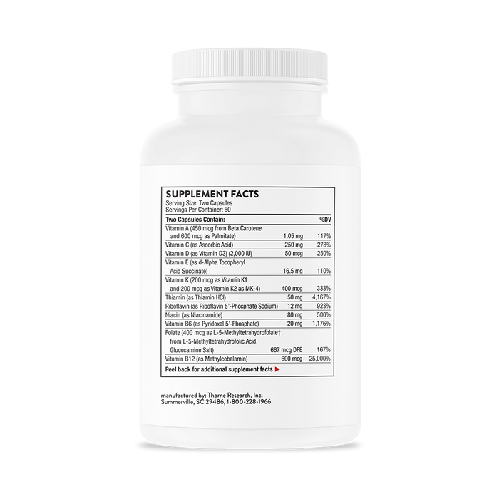 A white Thorne Basic Nutrients 2/Day bottle features clear black text showing Supplement Facts, ingredients, daily values, and manufacturer info. The easily readable label and cap are also white.