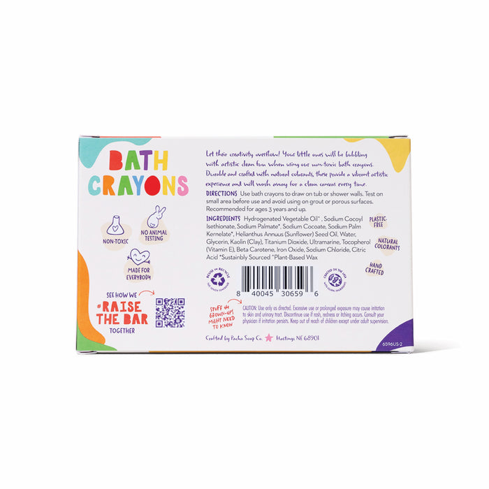 Back of a Pacha Soap Co. Bath Crayon box showing product info, directions, ingredients with natural colorants, and icons for non-toxic, vegan, palm oil free, and no animal testing. Text instructions and colorful geometric designs appear.