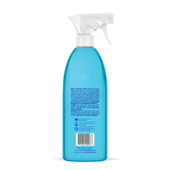 A method Bathroom Cleaner spray featuring a blue bottle and white trigger top includes ingredient details, usage instructions on the back label, and a barcode at the bottom. Ideal for tub and tile cleaning along with other bathroom surfaces.
