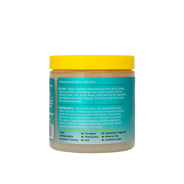 Alaffias Beautiful Curls Curl Defining Gel, in a jar with a yellow lid, displays ingredients and usage instructions. Labels emphasize its ethical, handcrafted, biodegradable, phthalate-free, paraben-free, mineral oil-free, synthetic dye-free, and cruelty-free—ideal for natural curls and frizz control.