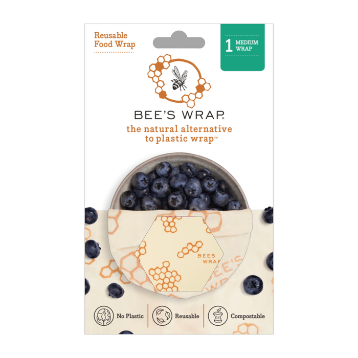 Bees Wrap Single Medium Wrap is a reusable, compostable, plastic-free beeswax food wrap shown partly covering blueberries—an eco-friendly alternative to plastic with one medium wrap per package.