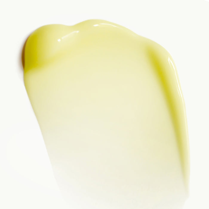 A smooth, thick layer of Cocokinds Beginner Retinol Gel in light yellow on a plain white background. This glossy, rich texture is enhanced by the Tri-Retinoid Comfort Complex™ for extra comfort and care.