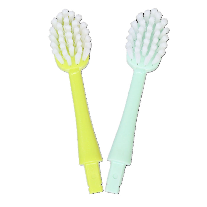 The Radius Big Kidz® Forever Brush™ 2 Pack Replacement Heads are shown side by side on a white background, each with a slim neck and white biobased bristles—one in yellow, the other in light green.