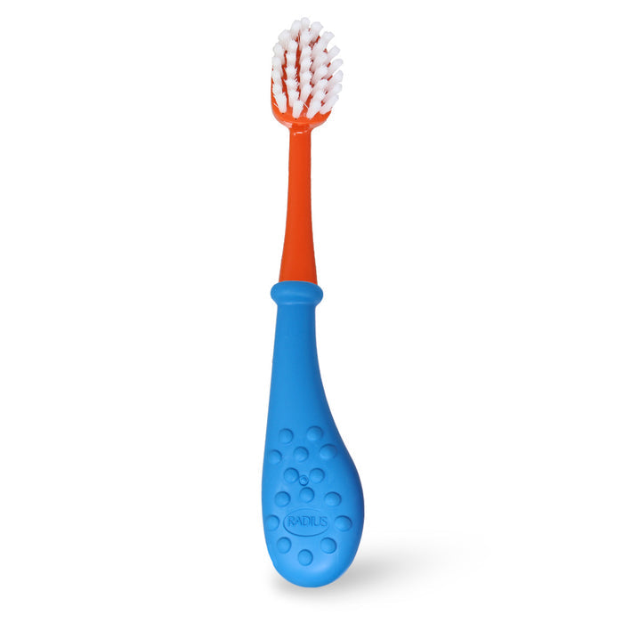 The Big Kidz® Forever Brush™ by Radius features a bright blue handle with textured dots and a slim orange neck leading to a round head. It has tightly packed, bio-based white bristles on a wider bristle bed.