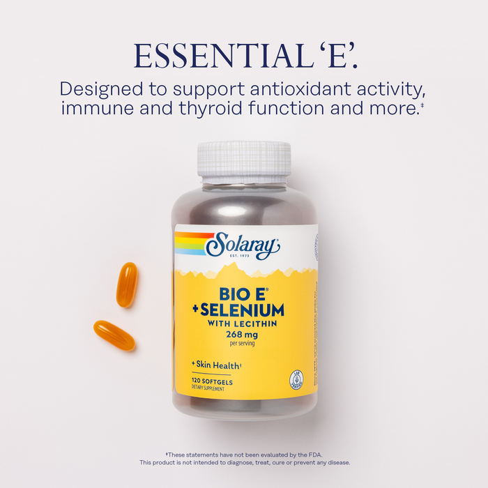 A bottle of Solaray Bio E + Selenium softgels with lecithin, labeled as supporting antioxidant activity, immune, and thyroid function. The bottle is surrounded by some softgels on a white background.