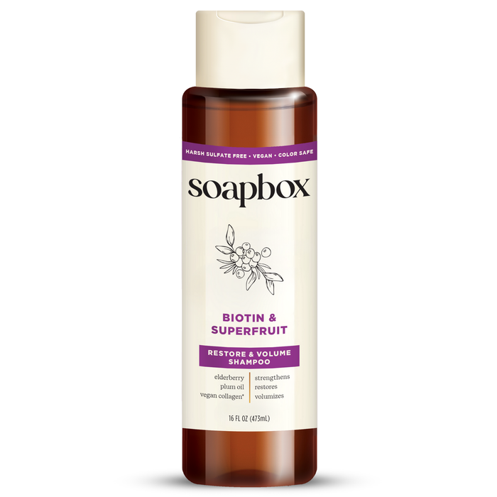 A 16 fl oz bottle of Soapbox Biotin and Superfruit Restore & Volumize Shampoo features Restore & Volume benefits, contains elderberry, plum oil, and vegan collagen. Its sulfate-free, vegan, and color-safe.