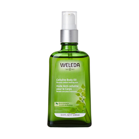 A 3.4 fl oz (100 ml) Weleda Birch Cellulite Body Oil in a green glass bottle with a white pump. The label, with English and French text, highlights Rich Extracts and birch leaf illustrations. Contains jojoba oil for effective cellulite reduction.