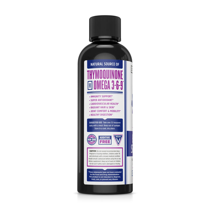 Zhou Nutritions Black Seed Oil bottle, in black, claims to be a natural source of Black Seed Oil and Omega 3-6-9. It promotes immunity support, heart health, and antioxidants. Suggested use and product info are provided on the label.
