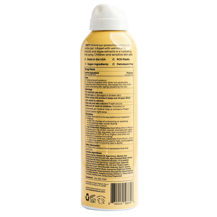 A yellow aerosol sunscreen from Miami Beach Bum, called Blocked BOV Spray - SPF 50, features a white cap. The back label emphasizes its reef-friendly formula with vegan ingredients and highlights its mineral sun protection, broad spectrum SPF 50, benefits, details, instructions, and petroleum-free composition.