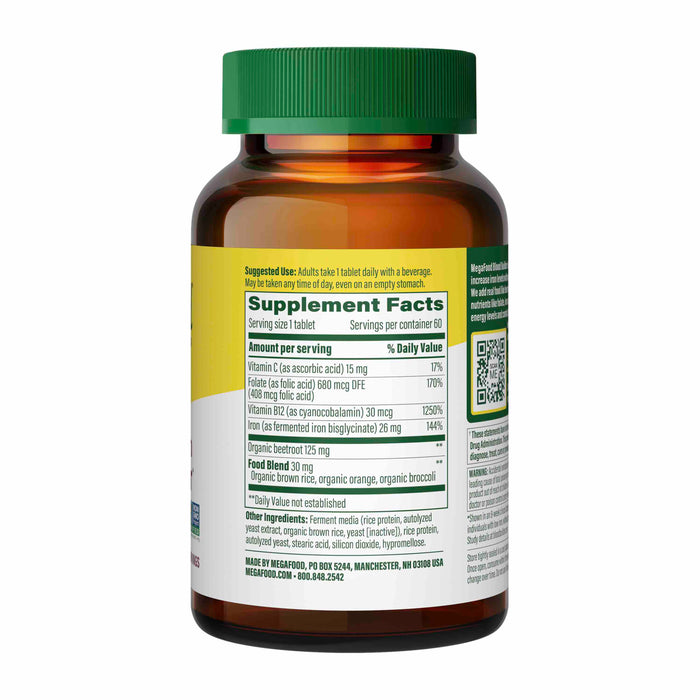 A green bottle of MegaFoods Blood Builder, featuring a green cap and black text on white, includes suggested use, supplement facts, and contact details. Its packed with vitamins and a food blend to support iron absorption.