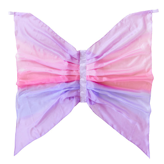 The Blossom Fairy Wings by Sarahs Silks are crafted from mulberry silk in pink, purple, and blue. These fabric butterfly wings are symmetrical with a gathered center, offering a soft gradient effect. Delicate and translucent, theyre perfect for dress-up play.