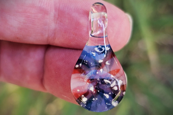 blue swirl pendant with cremation ash