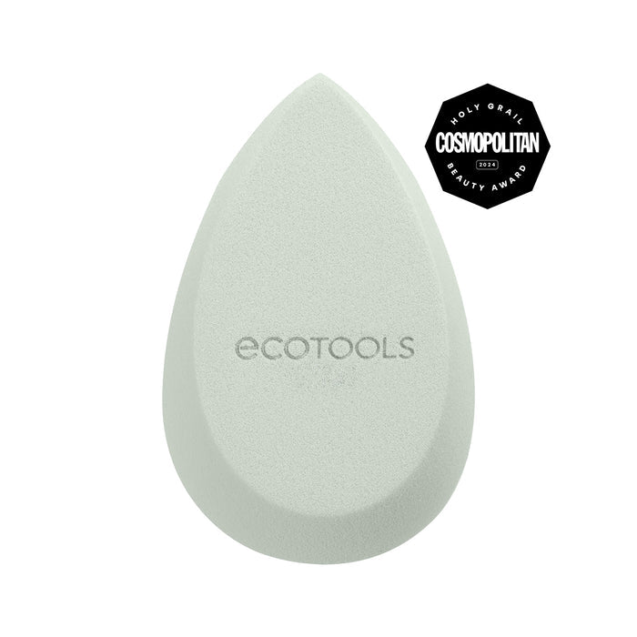 A light green, teardrop-shaped makeup sponge with the logo "ecotools" on it. It features a badge that reads "Cosmopolitan Holy Grail Beauty Award 2022.