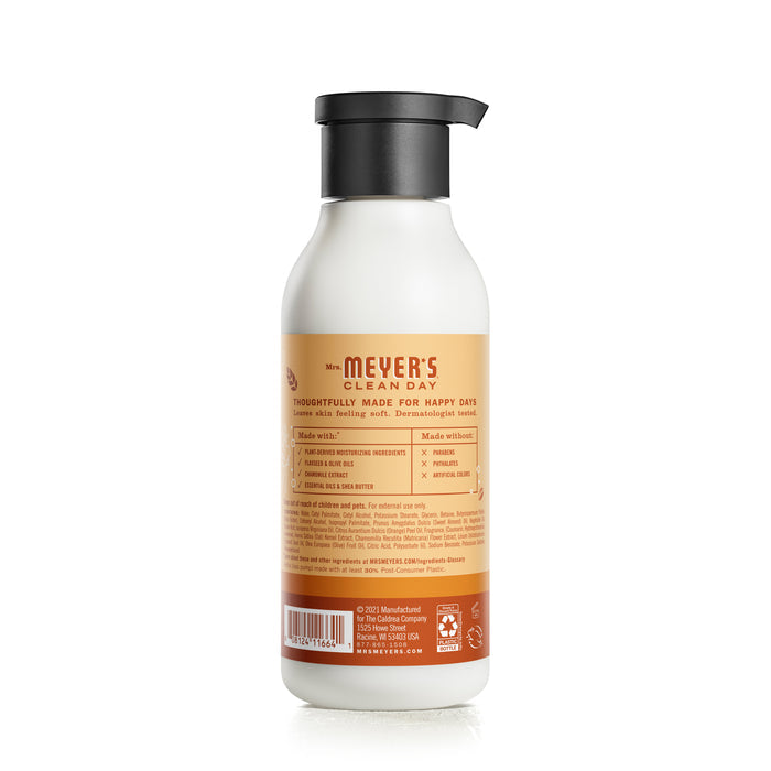 Mrs. Meyers Body Lotion, with its minimalist theme, features a black cap and an orange-yellow label highlighting naturally derived ingredients and garden-inspired scents. The design is accented by small icons at the bottom, adding elegance to any space.