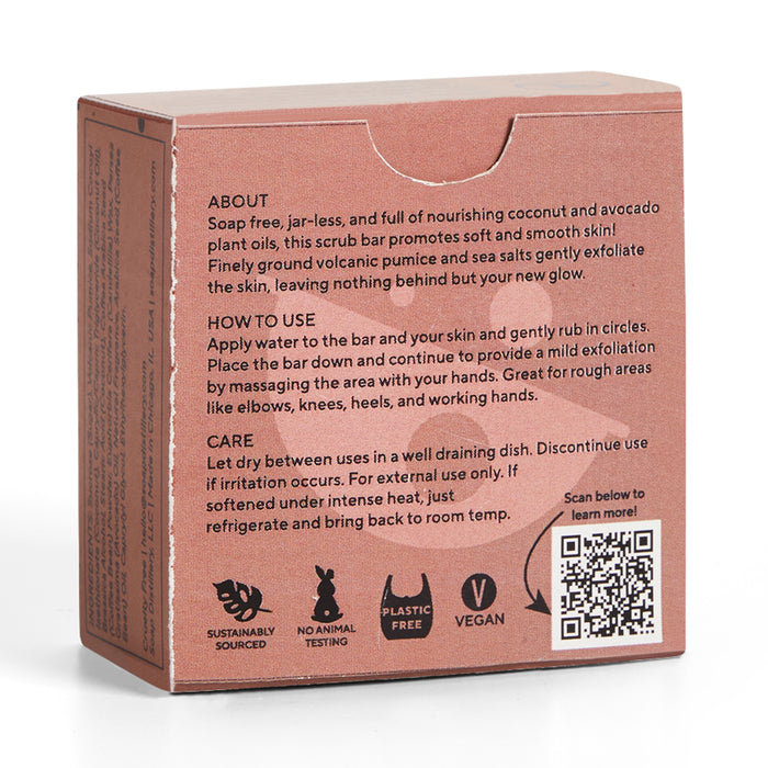 A brown box for Soap Distillerys Body Scrub Bar features white text detailing exfoliating and moisturizing benefits, usage and care instructions, and emphasizes being sustainably sourced, cruelty-free, plastic-free, vegan-friendly. Includes a QR code.