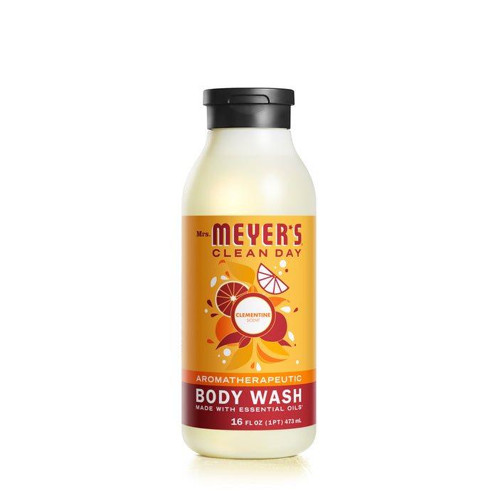 Mrs. Meyers Body Wash in a Clementine scent comes in a 16 oz bottle with garden-inspired fragrances and citrus illustrations on an orange label, complete with a sleek black cap.