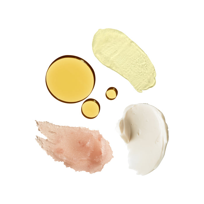 The Bodycare Bestsellers Set by OSEA features assorted smears on a white background, showcasing translucent yellow oil, pale green Undaria Algae-infused cream, pink gel, and white lotion. Each product presents distinct textures and visuals akin to a soothing travel set.