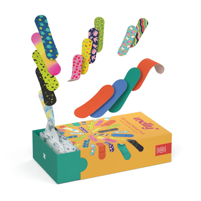 An array of colorful Bravery Bandages Refill by Welly, showcasing various patterns, playfully emerges from an open Welly tin. The 100-count pack features a similarly decorated tin and includes extra wrapped bandages inside.