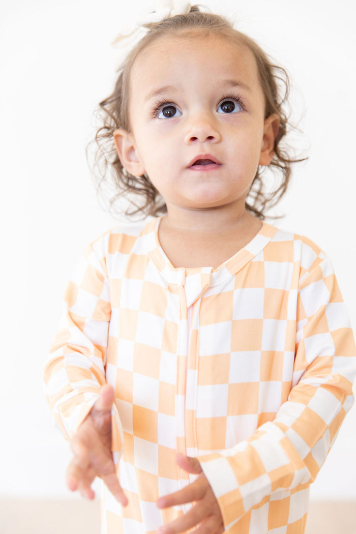 BRIGHT ORANGE + WHITE CHECKER | FOOTIE ONE PIECE