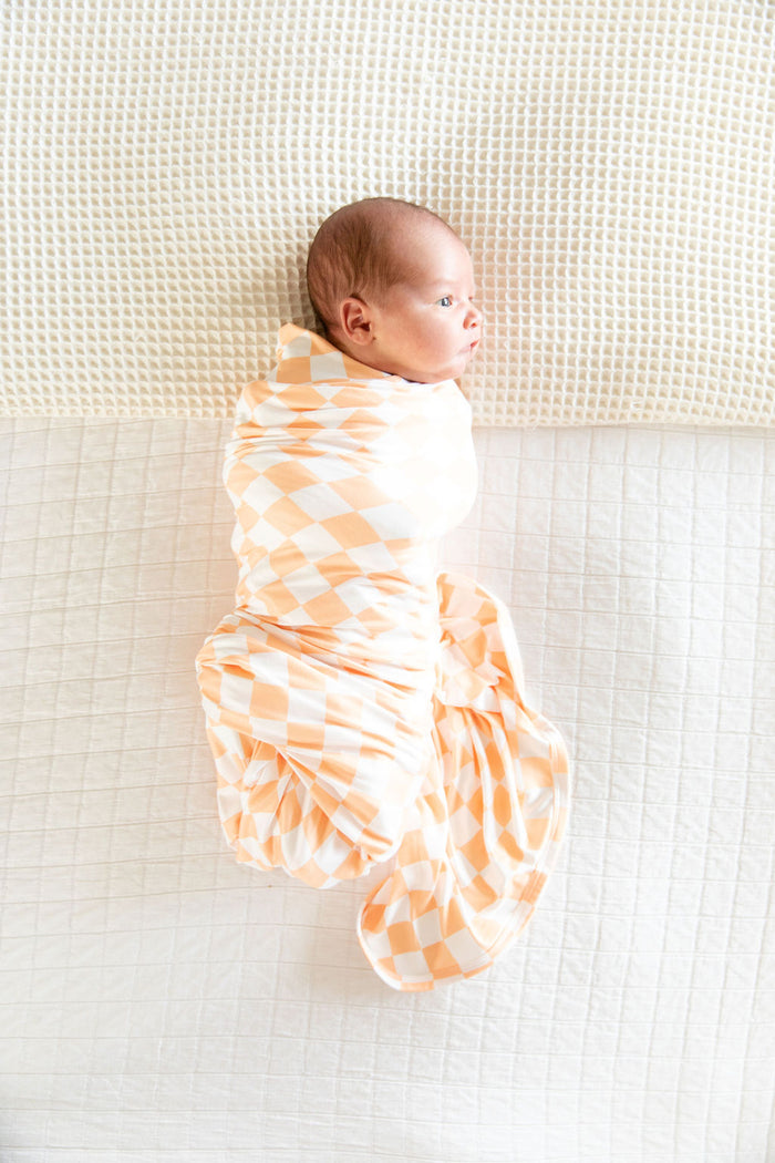 BRIGHT ORANGE + WHITE CHECKER | SWADDLE