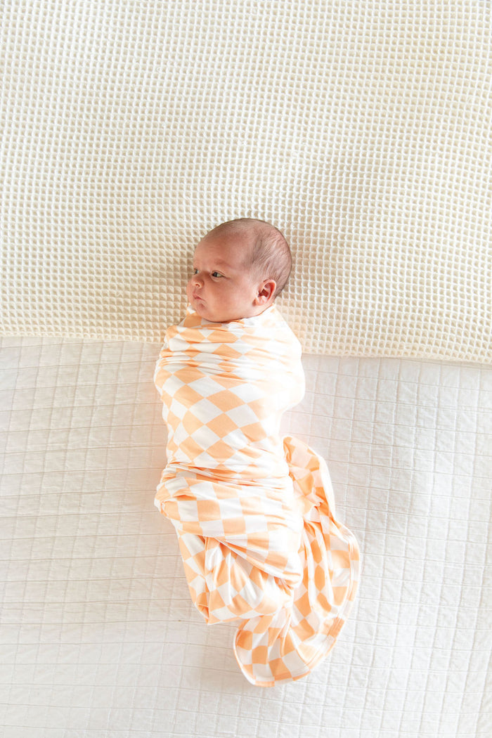 BRIGHT ORANGE + WHITE CHECKER | SWADDLE