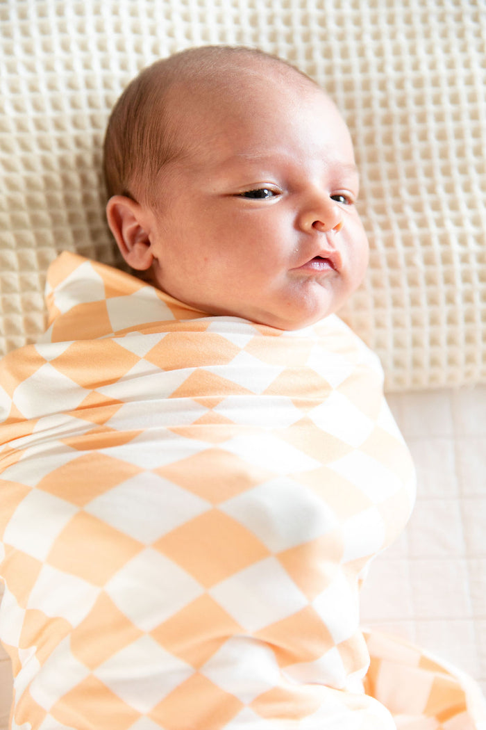 BRIGHT ORANGE + WHITE CHECKER | SWADDLE