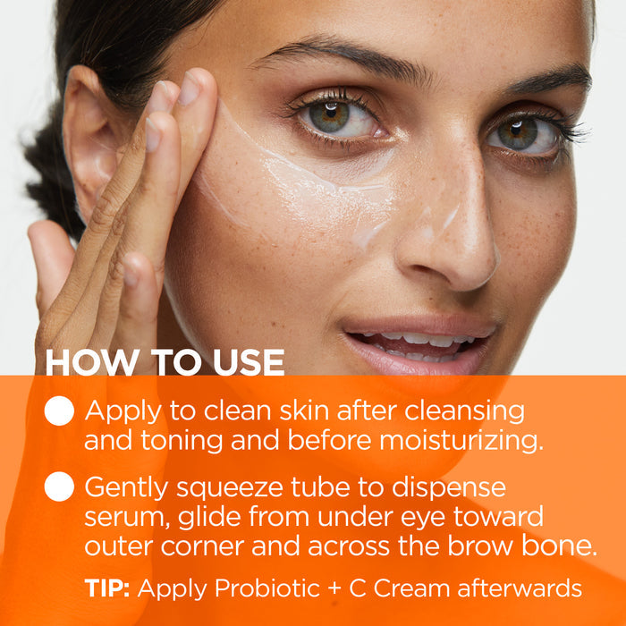 Woman applying skincare serum under her eye, with instructions for use. Text includes: "Apply to clean skin after cleansing and toning before moisturizing. Gently squeeze tube to dispense serum, glide from under eye toward outer corner and across brow bone.