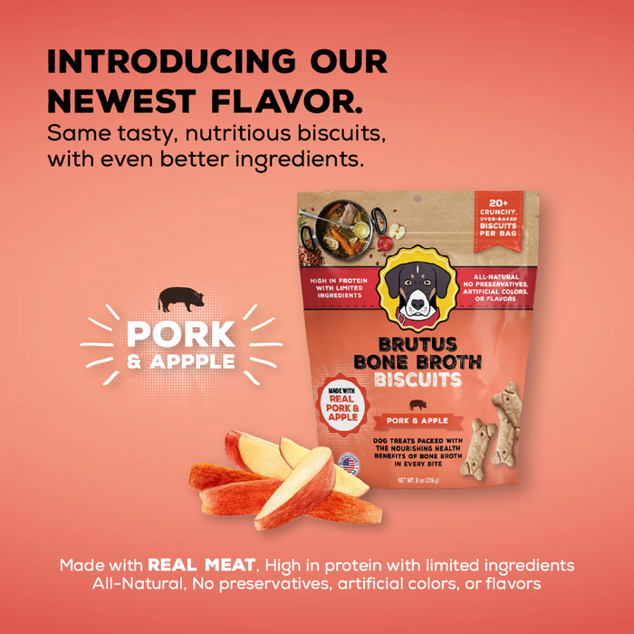 Image of a package of Brutus Bone Broth Biscuits in Pork &amp; Apple flavor. The packaging features a cartoon dog and highlights high protein, all-natural ingredients, and no preservatives. Slices of apple and a pig icon are shown nearby.