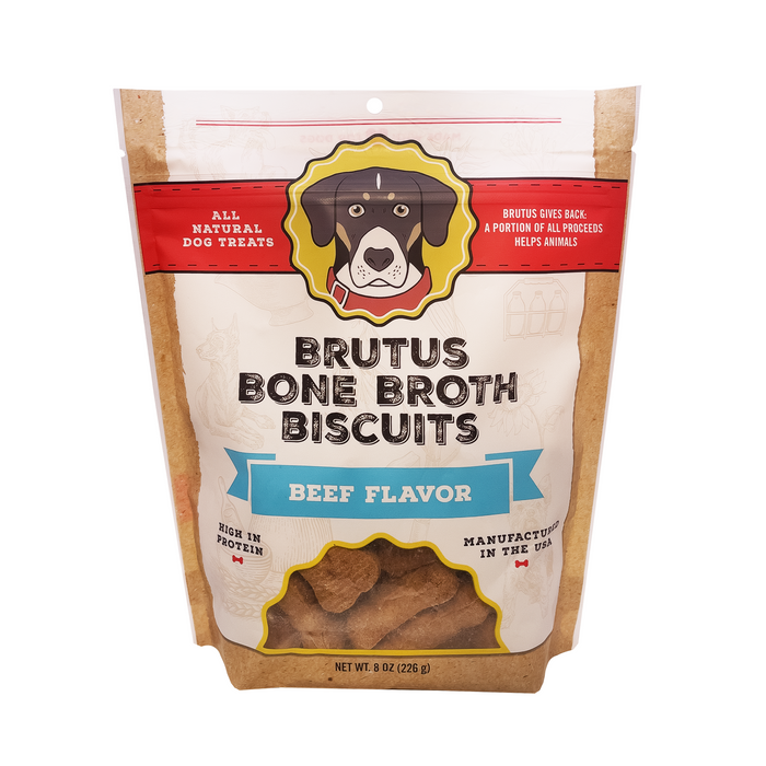 Brutus Bone Broth Biscuits by Brutus Broth are beef-flavored treats with real meat for joint health. The brown bag features a cartoon dog and emphasizes High in Protein and Manufactured in the USA. Part of the proceeds supports animals.