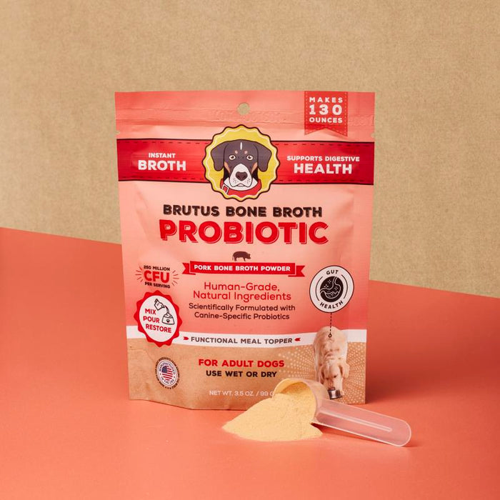 Brutus on the Go: Probiotics Instant Bone Broth Mega Pack by Brutus Broth features a dog image on the label, highlighting supports gut health and natural ingredients. A powder scoop and measuring spoon ensure optimal canine probiotics delivery.
