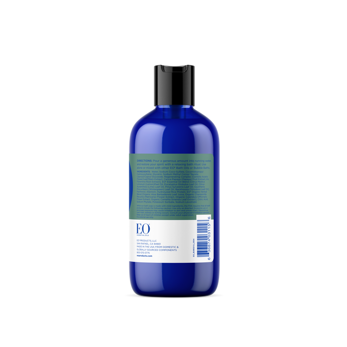 A blue bottle of EO Products Bubble Bath with a black flip-top cap exudes French Lavenders calming scent. The back label lists directions, ingredients, and a barcode, but the text is small and hard to read.