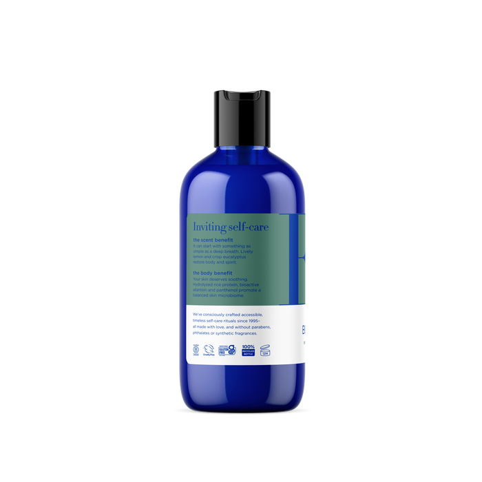 A blue EO Products Bubble Bath bottle with a black flip-top cap sits against a white backdrop. The label says Inviting self-care, listing benefits and French Lavender ingredients. Eco-friendly and cruelty-free icons make it perfect for your bubble bath ritual.