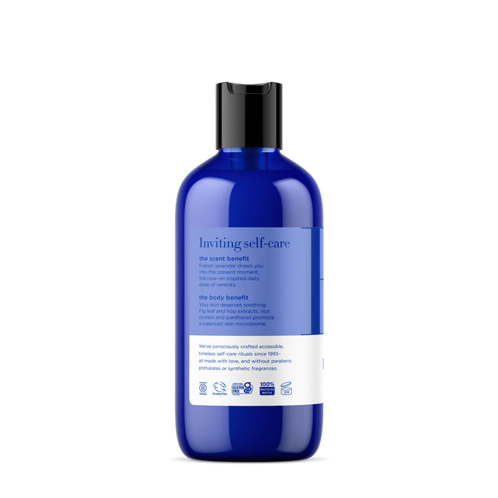 EO Products Bubble Bath in a blue Inviting Self-Care bottle highlights the calming scent of French Lavender and body benefits. This dermatologist-recommended bubble bath promises a soothing experience without synthetic fragrances and features eco-friendly symbols.