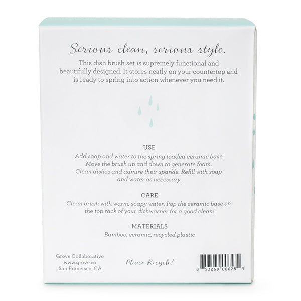 The image shows the back of a Grove Co. product box for the Bubble Up Dish Soap Dispenser & Brush Set. It details a dish brush set with use and care instructions, made from bamboo, ceramic, and recycled plastic, maintaining a simple and clean design.