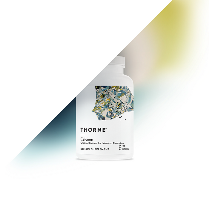 A white Thorne Calcium dietary supplement bottle, designed for enhanced absorption, is on a split background. The bottom left is white, and the top right features yellow, green, and blue hues. It has an abstract design suitable for peri- and postmenopausal women.
