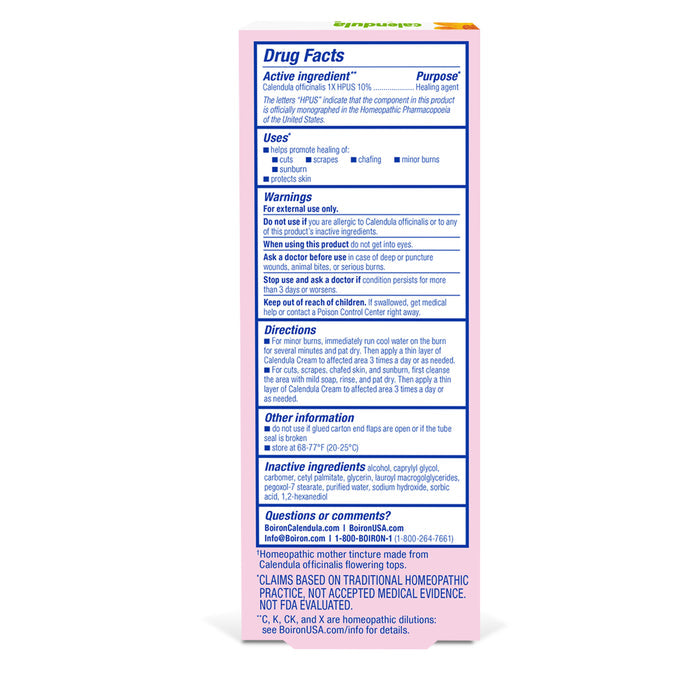 The image shows the back of the Boiron Calendula Cream box labeled Drug Facts, highlighting active ingredients, uses, warnings, directions, and contact info. This cream provides natural healing for skin irritations and minor burns.