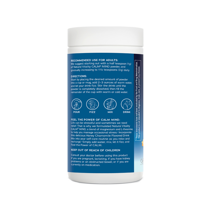 A white cylindrical container with a blue label from Natural Vitality features their CALM Magnesium Supplement Drink Mix. It highlights calming benefits and includes usage tips, prep directions, and cautions to keep away from children. Ideal for tranquility seekers with added L-theanine.