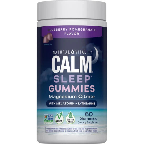 A bottle of Natural Vitality CALM Sleep with Melatonin Gummies in blueberry-pomegranate flavor, featuring magnesium citrate and L-theanine. Vegan, gluten-free, non-GMO; each bottle contains 60 gummies.