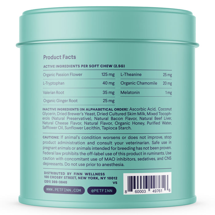A green container of Finns Calming Aid Supplement for Dogs features natural ingredients such as organic passion flower, L-Tryptophan, valerian root, and ginger root. Its designed to alleviate dog anxiety and includes cautionary notes and contact details for pet health concerns.