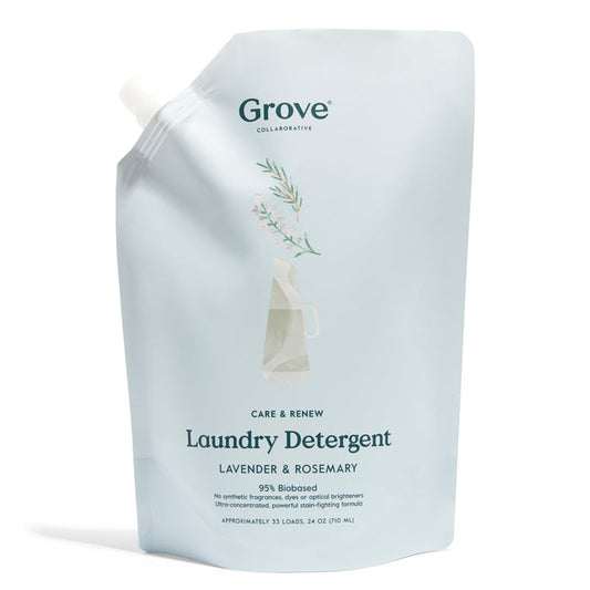 A light blue pouch of Grove Co. Care & Renew Liquid Laundry Detergent is shown, featuring a minimalist floral design. The label highlights a lavender and rosemary scent, plant-based ingredients, 95% biobased content, and EPA Safer Choice certification. Designed for 53 loads.