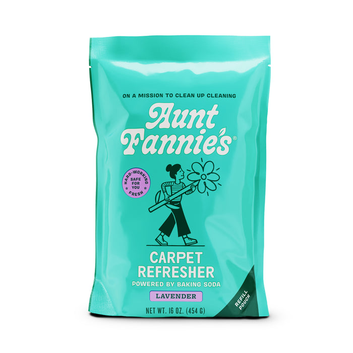 Aunt Fannies Carpet Refresher - Refill, 16 oz, features a turquoise package with pink circle emphasizing good words, safe food and illustration of a person with broom. Text states On a mission to clean up cleaning with vegan ingredients, powered by baking soda and essential oils, lavender scent.