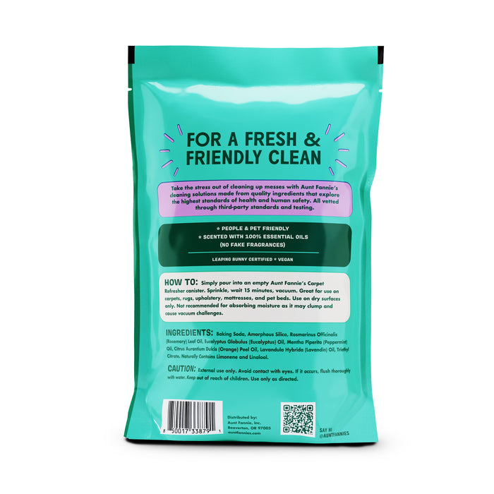 The back of the turquoise Carpet Refresher - Refill package from Aunt Fannies highlights product benefits and usage instructions. It states its people and pet-friendly, scented with essential oils, and vegan. Ingredients and recycling info are located at the bottom.