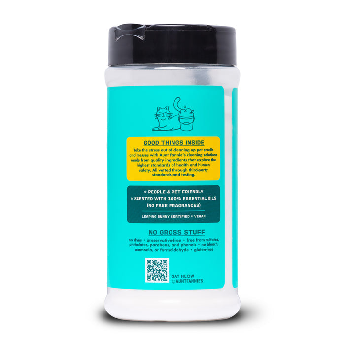 Aunt Fannies Carpet Refresher for Cats comes in a turquoise container with a black lid featuring two cat illustrations. This vegan, essential-oil scented deodorizer neutralizes odors gently and is free from harsh chemicals or fake fragrances.