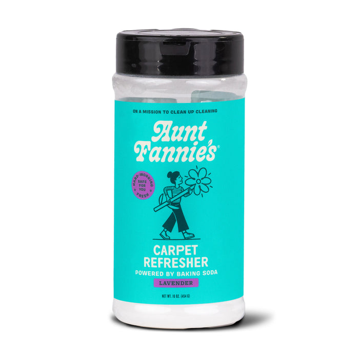 Aunt Fannies Carpet Refresher, in lavender scent, features a turquoise container with a woman holding a flower illustration. Its baking soda-powered formula ensures clean carpets and is marked people + pet safe for peace of mind.