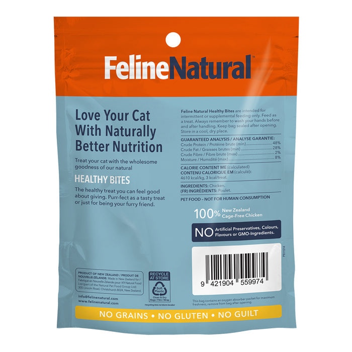 Back of a Feline Natural Grain-Free Freeze-Dried Cat Treats bag in blue and orange, featuring product info, nutritional details, barcode, ingredients, and icons for no grains, no gluten, and no artificial additives.