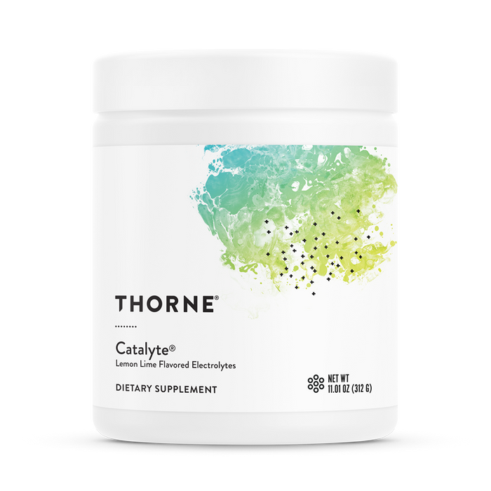 A white container of Thornes Catalyte electrolyte powder holds 11.0 oz (312g) with a lemon-lime flavor and features abstract green and blue artwork, ideal for electrolyte restoration and endurance support.