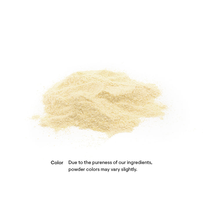 A small pile of light yellow powder on a white background. Below, a note reads: "Color - Due to the pureness of our ingredients, powder colors may vary slightly.