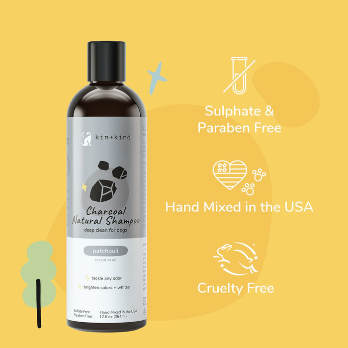 A bottle of kin+kinds Charcoal Deep Clean Natural Shampoo for dogs boasts a soothing patchouli scent on a sunny yellow background. Its hypoallergenic, sulfate and paraben-free, cruelty-free, and hand-mixed in the USA with a sleek black lid and graphic icons.